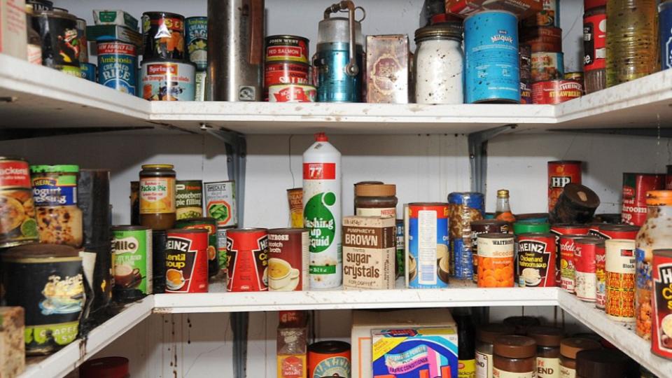A larder, packed with tins and miscellany goods